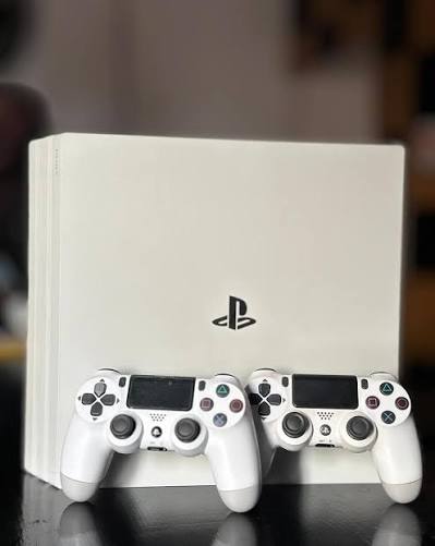 Renewed PlayStation 4 Pro 1TB Console | 2 DualShock Controllers | White